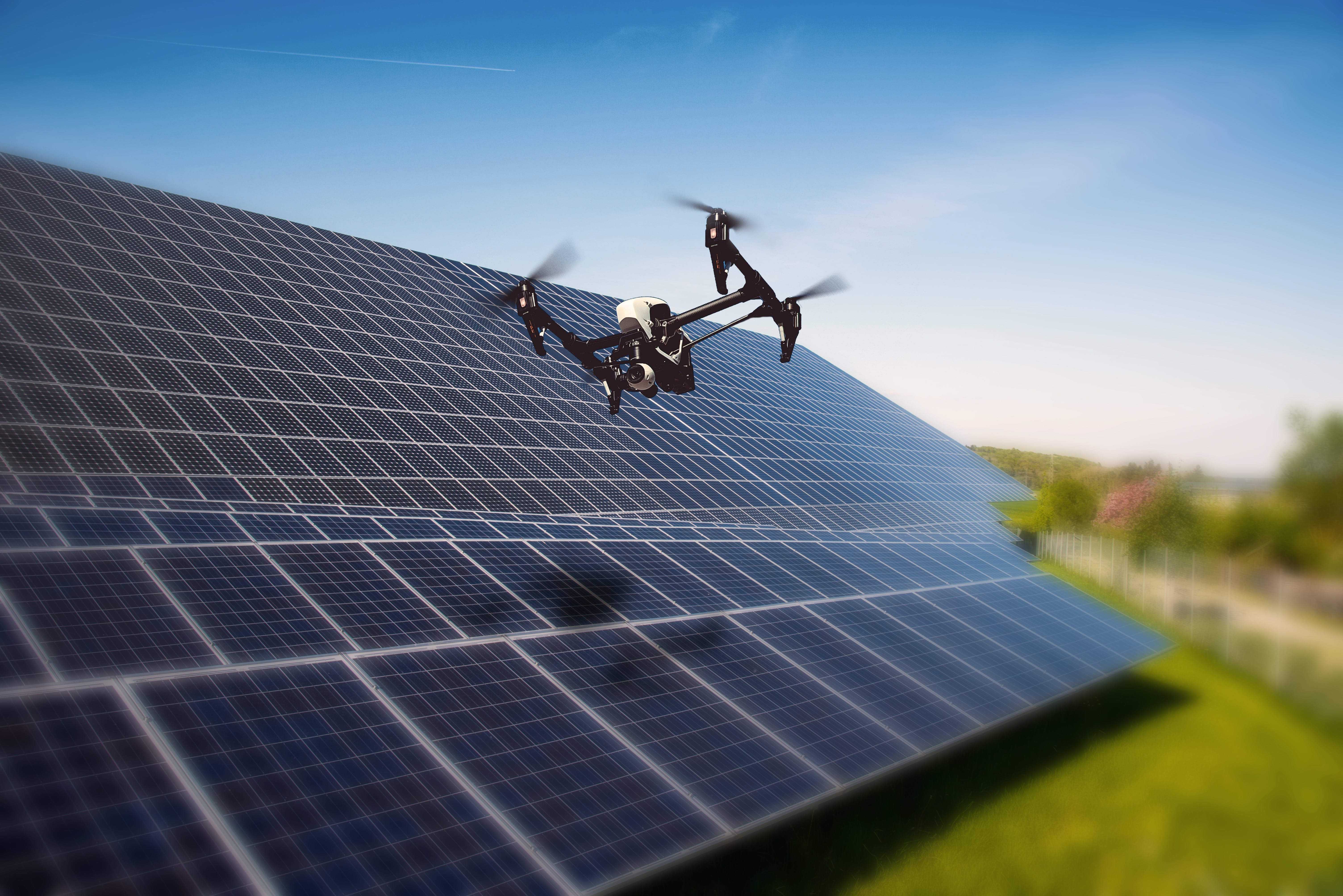 a drone inspecting a photovoltaic installation