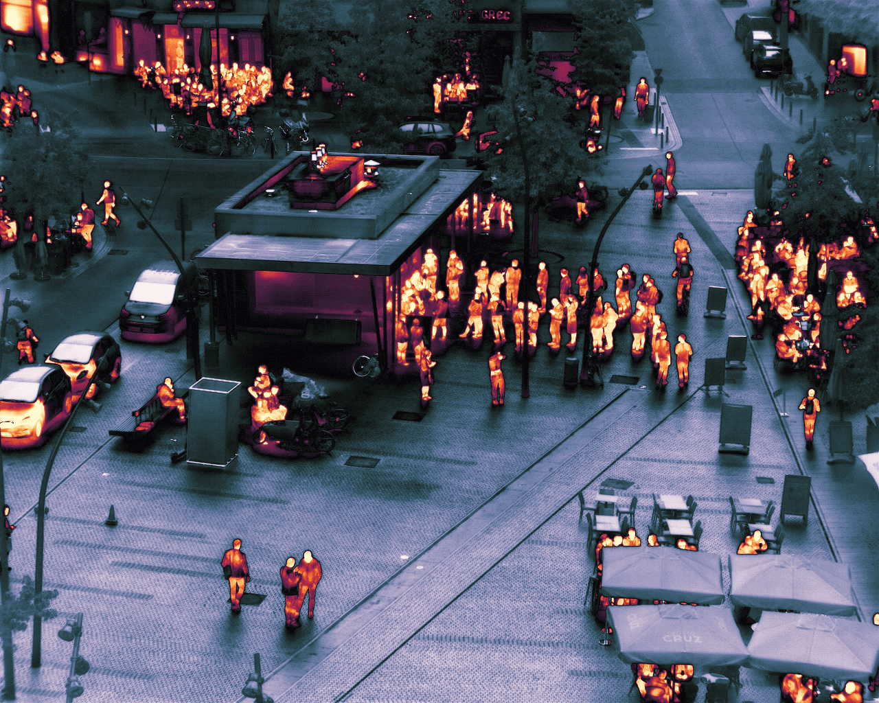 View of a square full of people facing a food truck